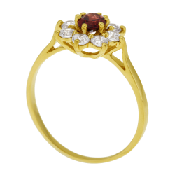 Bague en or jaune, grenat ovale  et oxydes de zirconium