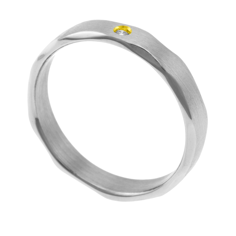 Bague en or jaune et acier , diamant