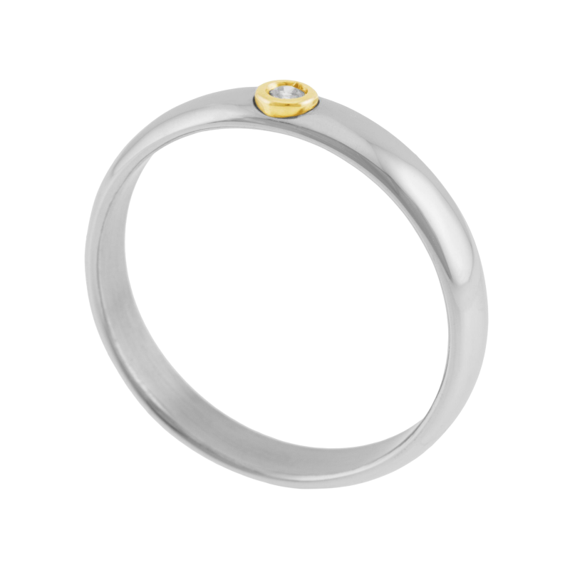 Bague en or jaune et acier, diamant