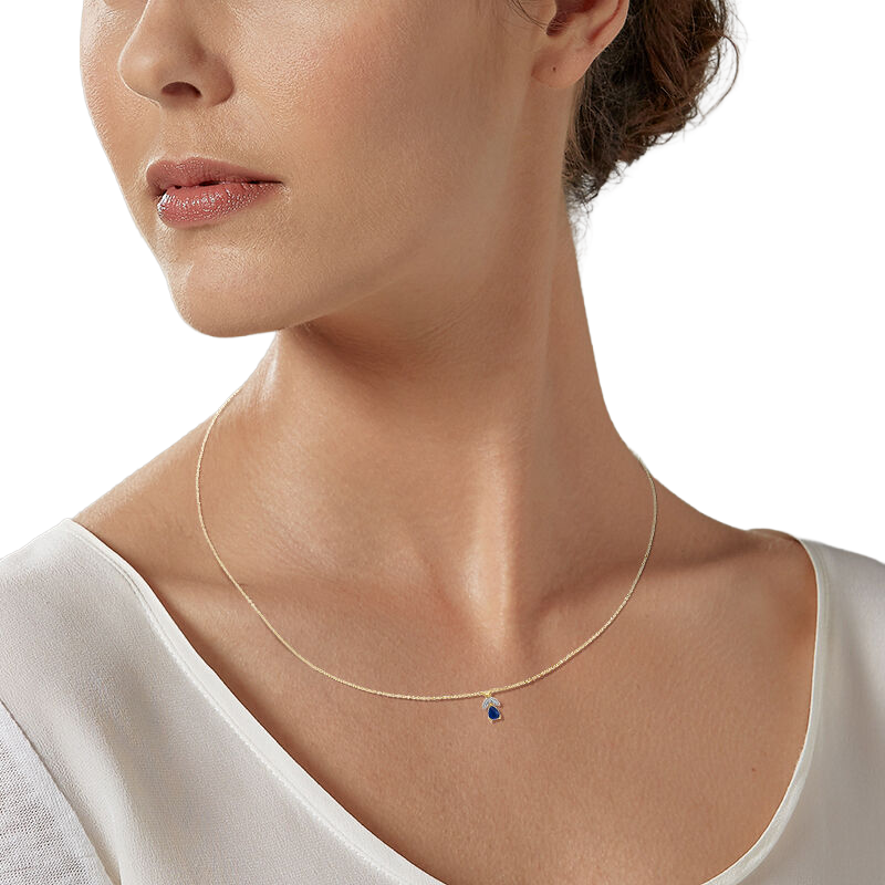Collier en or jaune rhodié, saphir et diamants