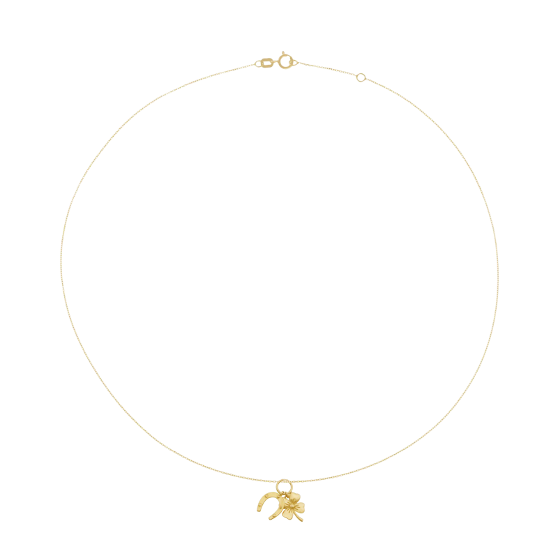 Collier en or jaune, trefle et fer à cheval 
