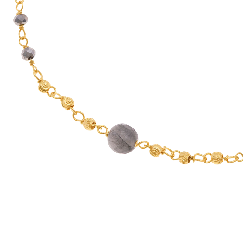 Bracelet en argent doré et pierres synthétiques