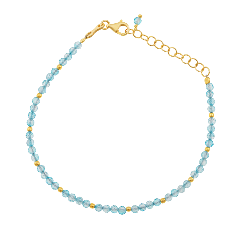 Bracelet en argent doré et perles synthétiques bleues