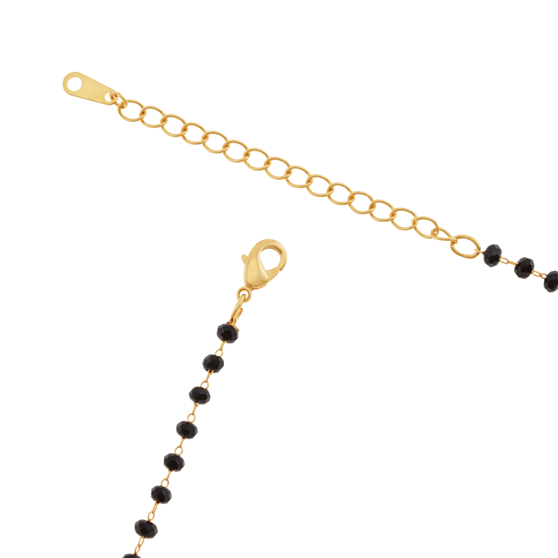 Collier en plaqué or et perles synthétiques noires
