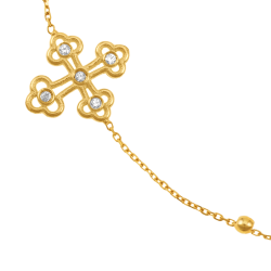 Bracelet en or jaune et oxydes de zirconium, croix