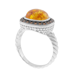 Bague en argent rhodié et rhodié noir, ambre et oxydes de zirconium