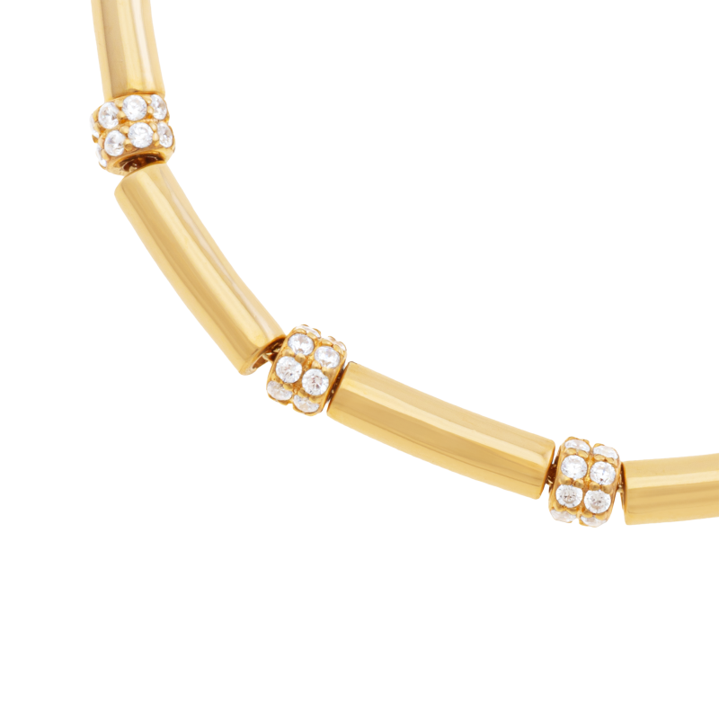 Bracelet en argent doré et oxydes de zirconium