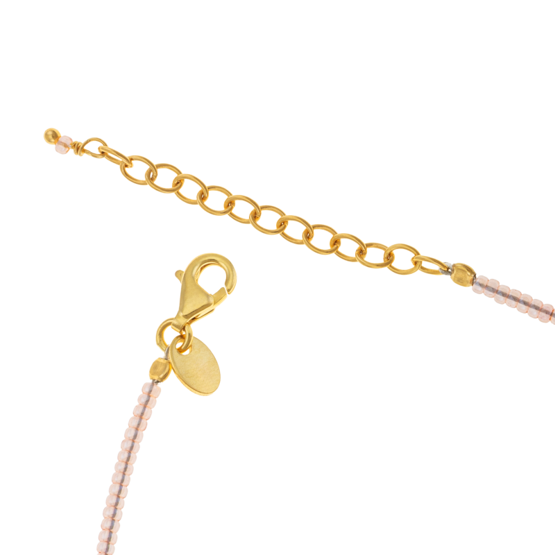 Bracelet en argent doré et perles synthétiques